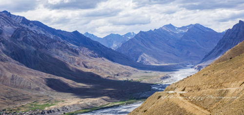 scenery of a mountain valley with a river running through it