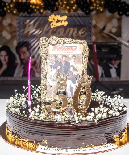 event picture of a cake with a picture of elvis and the elviss